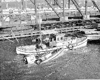 Towing Japanese fishing boats, ca. 1942.