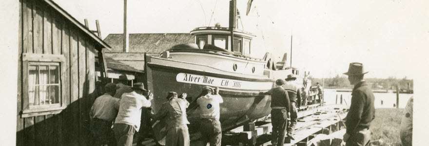 Photo caption: Alver-Mae being pushed on the ways, ca. 1950s. City of Richmond Archives photograph #2023 13 5 67