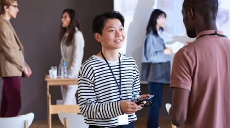 Two young adults engaged in discussion