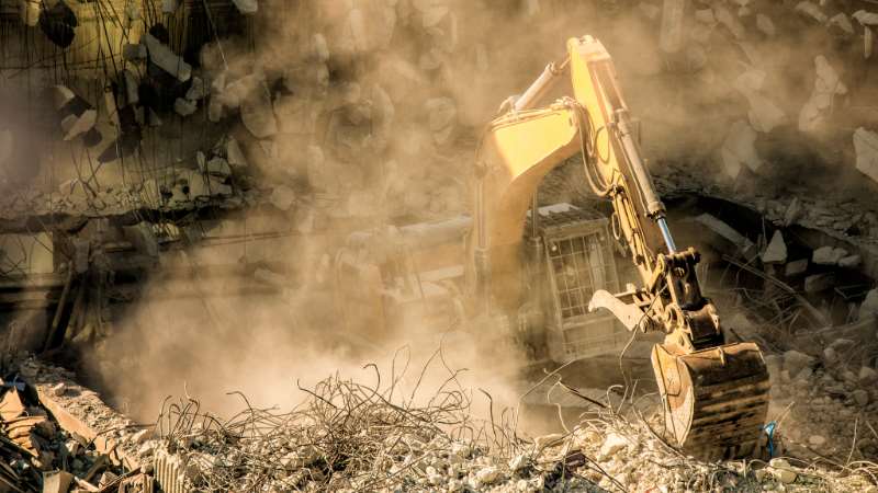Demolish a townhouse or apartment building