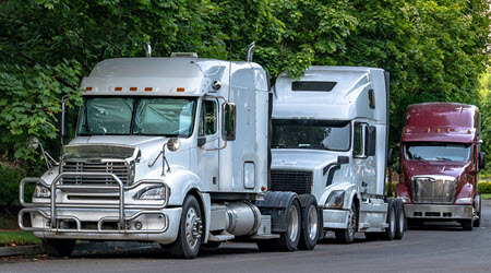 View of two commercial trucks