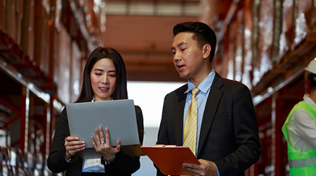 View of two business people in conversation