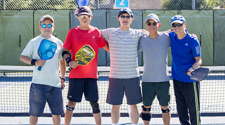 A group of seniors enjoying local sports together