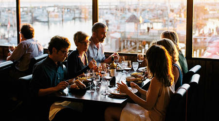 A group of people enjoying a local Richmond restaurant
