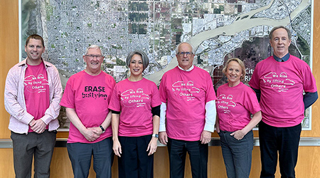 Members of City Council wearing pink t-shirts