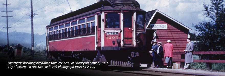 A photo of a red streetcar with people preparing to board,