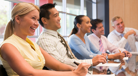 A diverse group of people at a meeting
